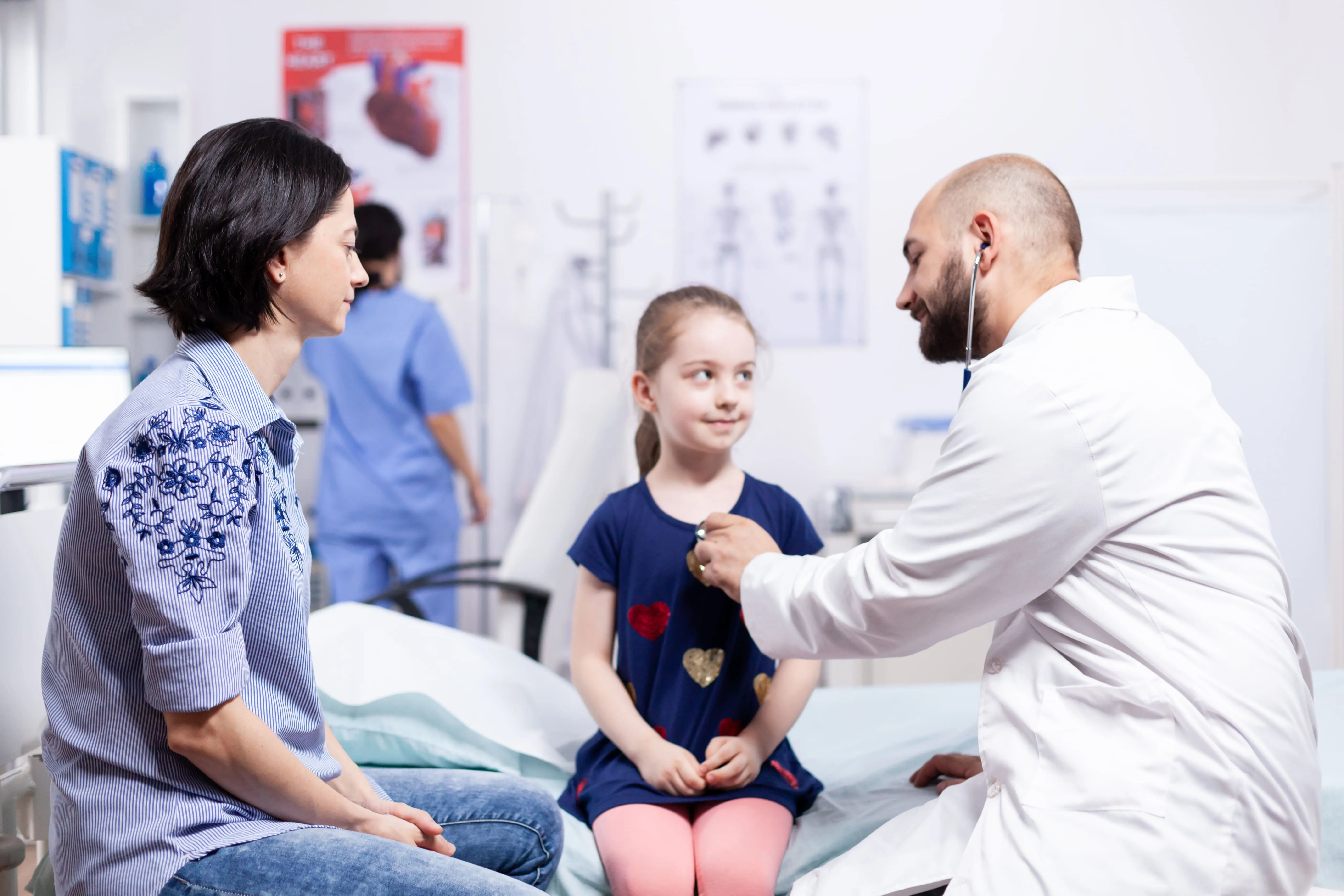 Doctor performing pediatric health consultation for a child, supported through international medical treatment coordination by 360Five Medicare